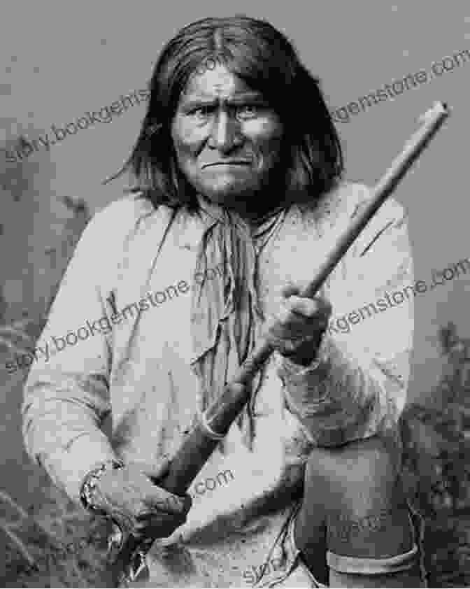 Geronimo, The Renowned Apache Leader, Stands Defiantly Against A Backdrop Of Western Terrain, Gazing Into The Distance With Unwavering Determination. His Piercing Eyes, Angular Features, And Ornate Headdress Epitomize The Enigmatic Figure Who Played A Pivotal Role In Shaping The Destiny Of Native American Tribes. Geronimo (The Lamar In Western History)