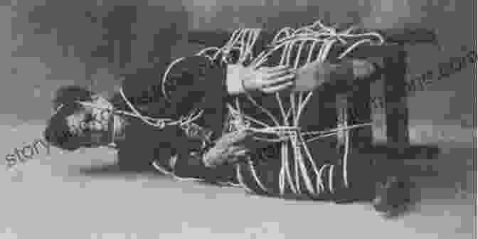 Harry Houdini Performing A Rope Escape Before A Captivated Audience Magical Rope Ties And Escapes (Old Magic Books)